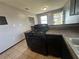 A kitchen with a gas range, countertop and tile flooring at 4009 Ester Sw Dr, Atlanta, GA 30331