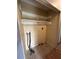 A dedicated laundry room is offered with storage shelf and hook-ups for washer and dryer machines at 4009 Ester Sw Dr, Atlanta, GA 30331