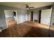 Spacious living room with hardwood floors, a ceiling fan, and ample natural light at 4009 Ester Sw Dr, Atlanta, GA 30331