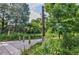 Trailhead entrance to the Atlanta BeltLine is shaded by mature trees at 59 Stafford Nw St, Atlanta, GA 30314