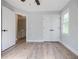 Bedroom with wood floors, double closets, and doorway leading to the staircase at 59 Stafford Nw St, Atlanta, GA 30314