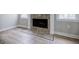 Living room featuring a fireplace with light gray tile and trim at 59 Stafford Nw St, Atlanta, GA 30314