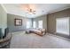 Large bonus room featuring neutral carpet, plenty of space, and natural light at 6084 Queens River Dr, Mableton, GA 30126