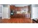 Spacious kitchen featuring custom cabinets, granite countertops, and modern appliances at 6084 Queens River Dr, Mableton, GA 30126
