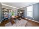 Dedicated home office space with built-in shelves and a large window at 6084 Queens River Dr, Mableton, GA 30126