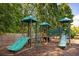A vibrant playground with slides, ladders, and platforms for children to explore and enjoy outdoor fun at 6084 Queens River Dr, Mableton, GA 30126