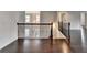 Hallway featuring hard wood floors at 9270 Colham Dr, Cumming, GA 30041