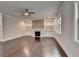 Bright living room with fireplace and built in cabinets at 9270 Colham Dr, Cumming, GA 30041