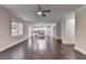 Spacious open concept living room overlooking kitchen with natural light at 9270 Colham Dr, Cumming, GA 30041