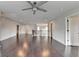 Upstairs loft with beautiful hardwood floors, neutral paint, and recessed lighting at 9270 Colham Dr, Cumming, GA 30041