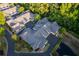 Beautiful aerial view of townhomes surrounded by lush greenery and mature trees at 2623 Grapevine Cir # 602, Cumming, GA 30041