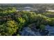 Scenic aerial shot of the community, showing a pond and green landscape at 2623 Grapevine Cir # 602, Cumming, GA 30041