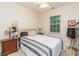 Cozy bedroom with carpet and furniture, baseball themed decor and good natural light at 2623 Grapevine Cir # 602, Cumming, GA 30041