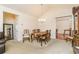 Elegant dining room features a formal dining set and an open layout, perfect for entertaining at 2623 Grapevine Cir # 602, Cumming, GA 30041
