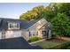Charming townhome showcasing neat landscaping, attached garage, and inviting curb appeal at 2623 Grapevine Cir # 602, Cumming, GA 30041