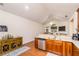 Bright, open kitchen with granite countertops, wooden cabinetry, and stainless steel appliances, perfect for cooking at 2623 Grapevine Cir # 602, Cumming, GA 30041