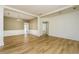 Bright and airy living room with hardwood floors and neutral wall colors at 312 Burdock Trce, Woodstock, GA 30188