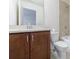 Bathroom with tile shower, dark wood vanity, and modern fixtures at 5260 Cresslyn Rdg, Alpharetta, GA 30005