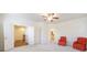 Large, empty bedroom features neutral walls, carpet and view into ensuite bathroom at 5260 Cresslyn Rdg, Alpharetta, GA 30005