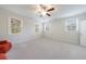 Spacious bedroom with neutral carpeting and ample natural light from multiple windows at 5260 Cresslyn Rdg, Alpharetta, GA 30005