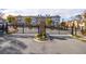 Gated community entrance adorned with holiday wreaths, providing security and festive charm at 5260 Cresslyn Rdg, Alpharetta, GA 30005
