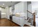 Well-lit kitchen featuring stainless steel appliances, granite countertops, and white subway tile backsplash at 5260 Cresslyn Rdg, Alpharetta, GA 30005