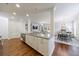 Open concept kitchen with granite counters, stainless appliances, island, and breakfast bar at 5260 Cresslyn Rdg, Alpharetta, GA 30005