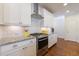 Kitchen with stainless steel appliances, granite countertops, and white subway tile backsplash at 5260 Cresslyn Rdg, Alpharetta, GA 30005