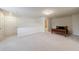 Spacious room with modern carpet, a view to an adjacent bathroom, and modern lighting at 5260 Cresslyn Rdg, Alpharetta, GA 30005
