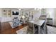 Open floor plan with living room, dining area, and hardwood floors, perfect for entertaining at 5260 Cresslyn Rdg, Alpharetta, GA 30005
