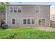 The backyard includes lawn and patio, providing space for outdoor activities at 1218 Matt Moore Ct, Lithia Springs, GA 30122