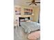 Bedroom featuring beach themed art over bed and light colored walls at 1218 Matt Moore Ct, Lithia Springs, GA 30122