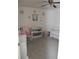 Bedroom with a crib, changing table, floral decals and soft carpet at 1218 Matt Moore Ct, Lithia Springs, GA 30122