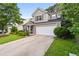 Lovely two-story home with stone accents and a two car garage at 1218 Matt Moore Ct, Lithia Springs, GA 30122