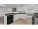 Efficient kitchen design with modern appliances and breakfast bar at 1218 Matt Moore Ct, Lithia Springs, GA 30122