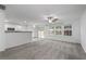 Bright living room next to kitchen and sliding door to the backyard at 1218 Matt Moore Ct, Lithia Springs, GA 30122