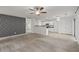 Inviting open-concept floor plan showcasing living room leading into kitchen area at 1218 Matt Moore Ct, Lithia Springs, GA 30122