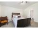Comfortable bedroom with a chair, natural lighting, and a ceiling fan at 5527 Jerome Rd, College Park, GA 30349