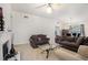 Cozy living room with a fireplace and comfortable sofas at 5527 Jerome Rd, College Park, GA 30349