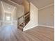 Spacious foyer with a staircase, light wood flooring, and plenty of natural light at 1277 Fern Ridge Ct # 22, Norcross, GA 30093
