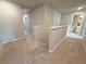 Upstairs hallway with carpet flooring and decorative molding at 1277 Fern Ridge Ct # 22, Norcross, GA 30093