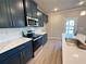 Close-up of kitchen showcasing granite countertops, stainless appliances, and stylish cabinets at 1277 Fern Ridge Ct # 22, Norcross, GA 30093