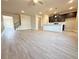 Open-concept living area with hard surface floors, dining area, and kitchen at 1277 Fern Ridge Ct # 22, Norcross, GA 30093