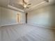 Large main bedroom with tray ceilings, plush carpets and easy access to the bathroom at 1277 Fern Ridge Ct # 22, Norcross, GA 30093