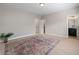 Spacious bedroom with carpet floors, adjacent bathroom, and walk-in closet at 1358 Pavilion Se Ct, Atlanta, GA 30316