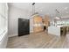 Modern kitchen with stainless steel appliances, marble countertops, and stylish lighting fixtures at 1358 Pavilion Se Ct, Atlanta, GA 30316