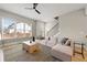A cozy and modern living room with stylish furniture, a ceiling fan, and staircase access at 1358 Pavilion Se Ct, Atlanta, GA 30316
