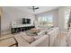 Bright and airy living room featuring a modern ceiling fan and lots of natural light at 1358 Pavilion Se Ct, Atlanta, GA 30316