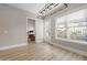 Bright room with a view, perfect as a home office or study, featuring wood floors and modern lighting at 1358 Pavilion Se Ct, Atlanta, GA 30316