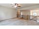 Second floor open loft with carpet, railing and views to the downstairs at 1645 Colleens Cask Ter, Dacula, GA 30019